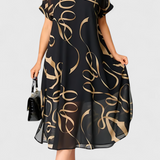 Allegra Vestido Negro con Estampado Abstracto en Oro y Escote en V
