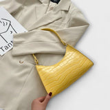 RAQUEL™ – Bolso brillante con estilo clásico