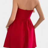 Kassandra Vestido Mini Halter con Espalda Abierta y Bolsillos