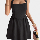Kassandra Vestido Mini Halter con Espalda Abierta y Bolsillos